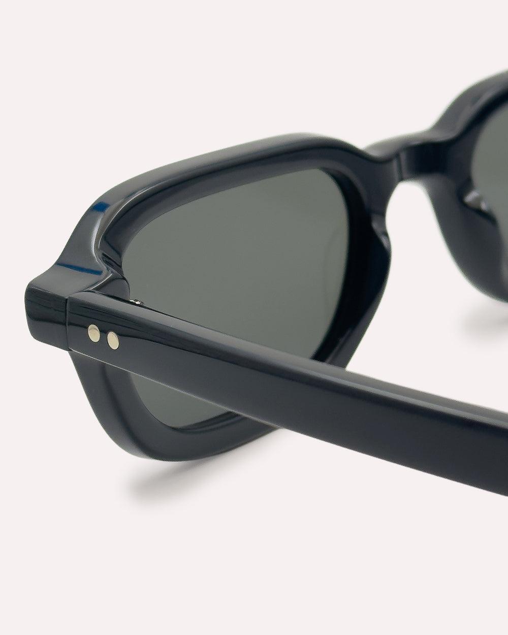 Plein Air Eyewear Cassatt sunglasses, black acetate frame with black lenses, detail of Italian acetate and hinge