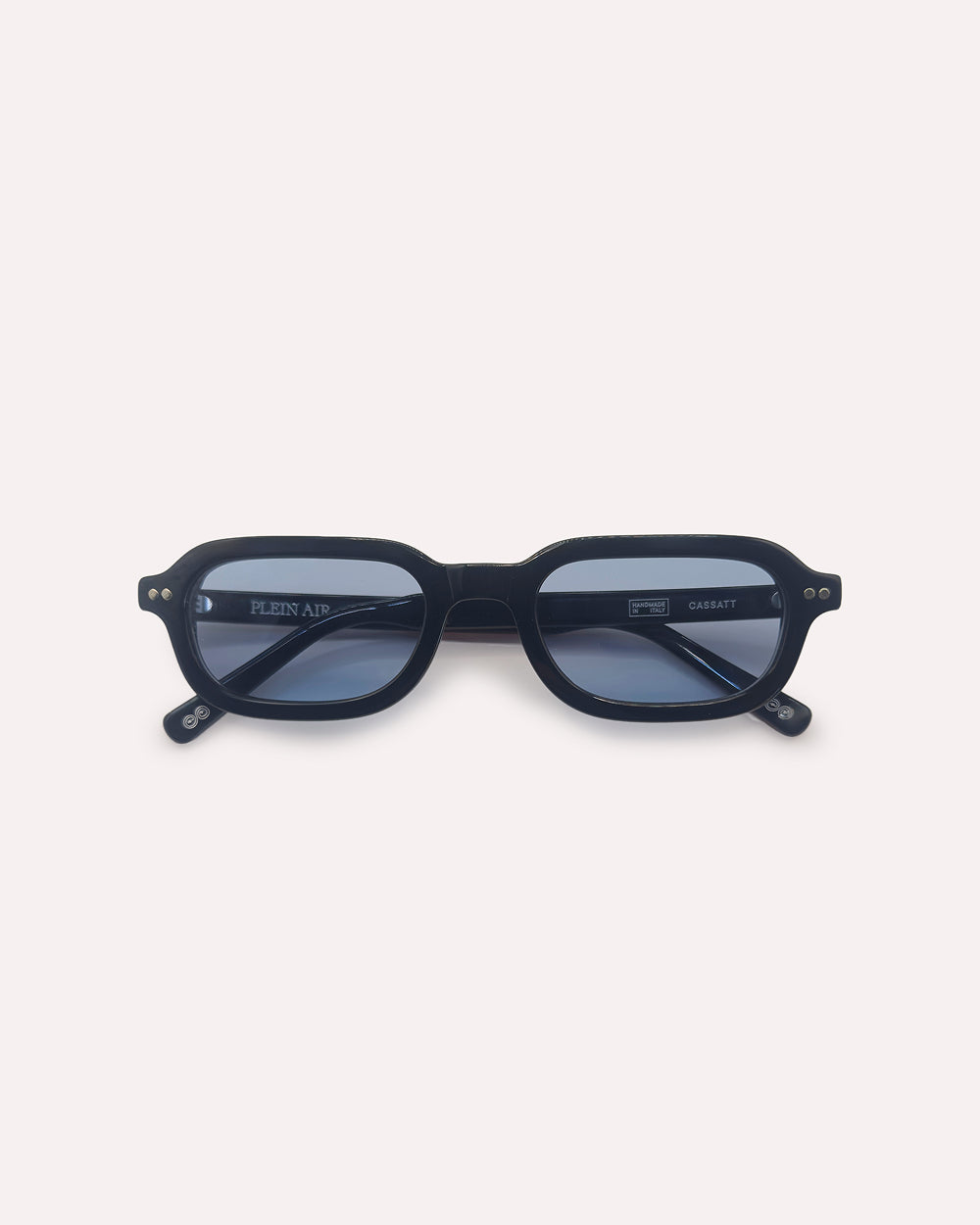 Plein Air Eyewear Cassatt sunglasses, black acetate frame with blue lenses, folded