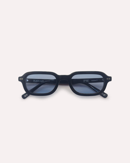 Plein Air Eyewear Cassatt sunglasses, black acetate frame with blue lenses, folded