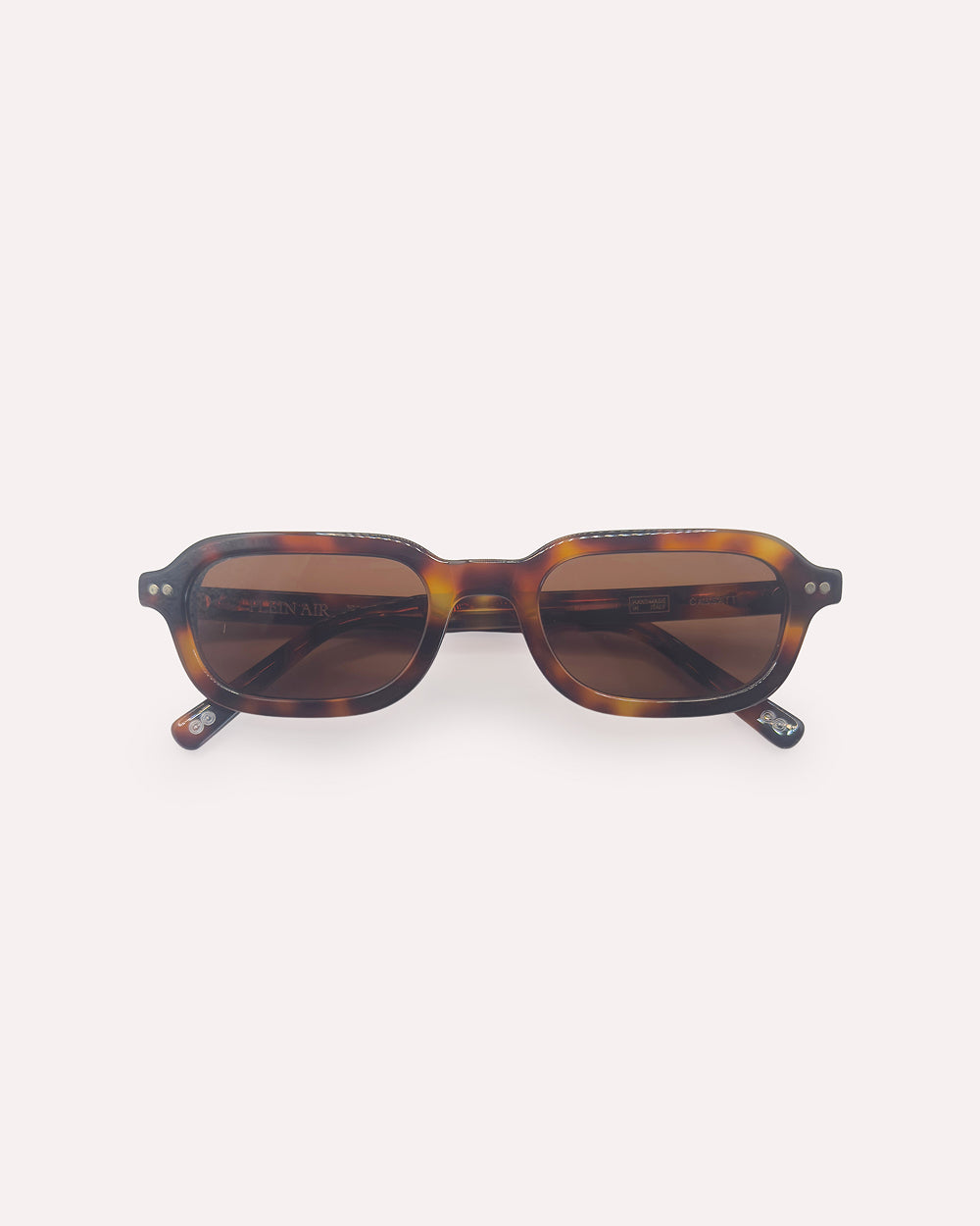Plein Air Eyewear Cassatt sunglasses, Havana tortoise acetate frame with brown lenses, folded